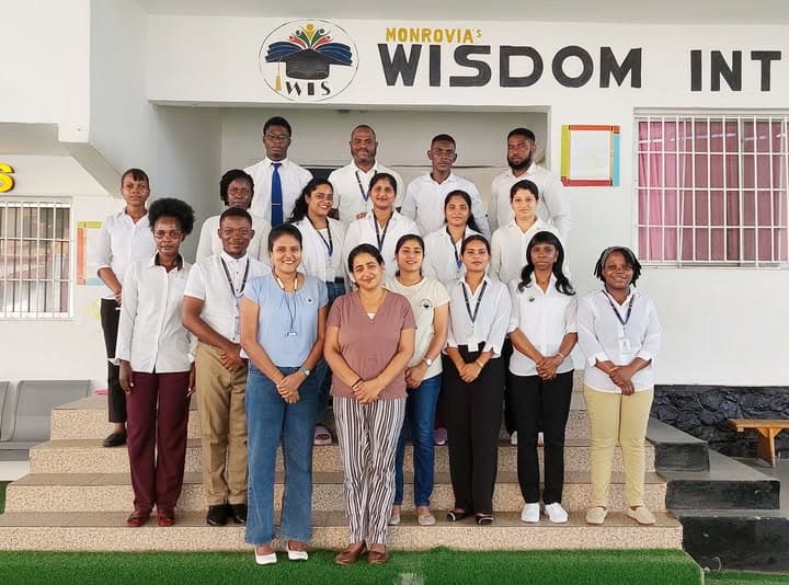 Teachers at Wisdom International School Monrovia with students